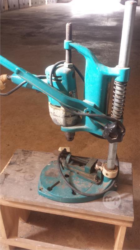 Black Decker drill stand with old drill. Maltapark